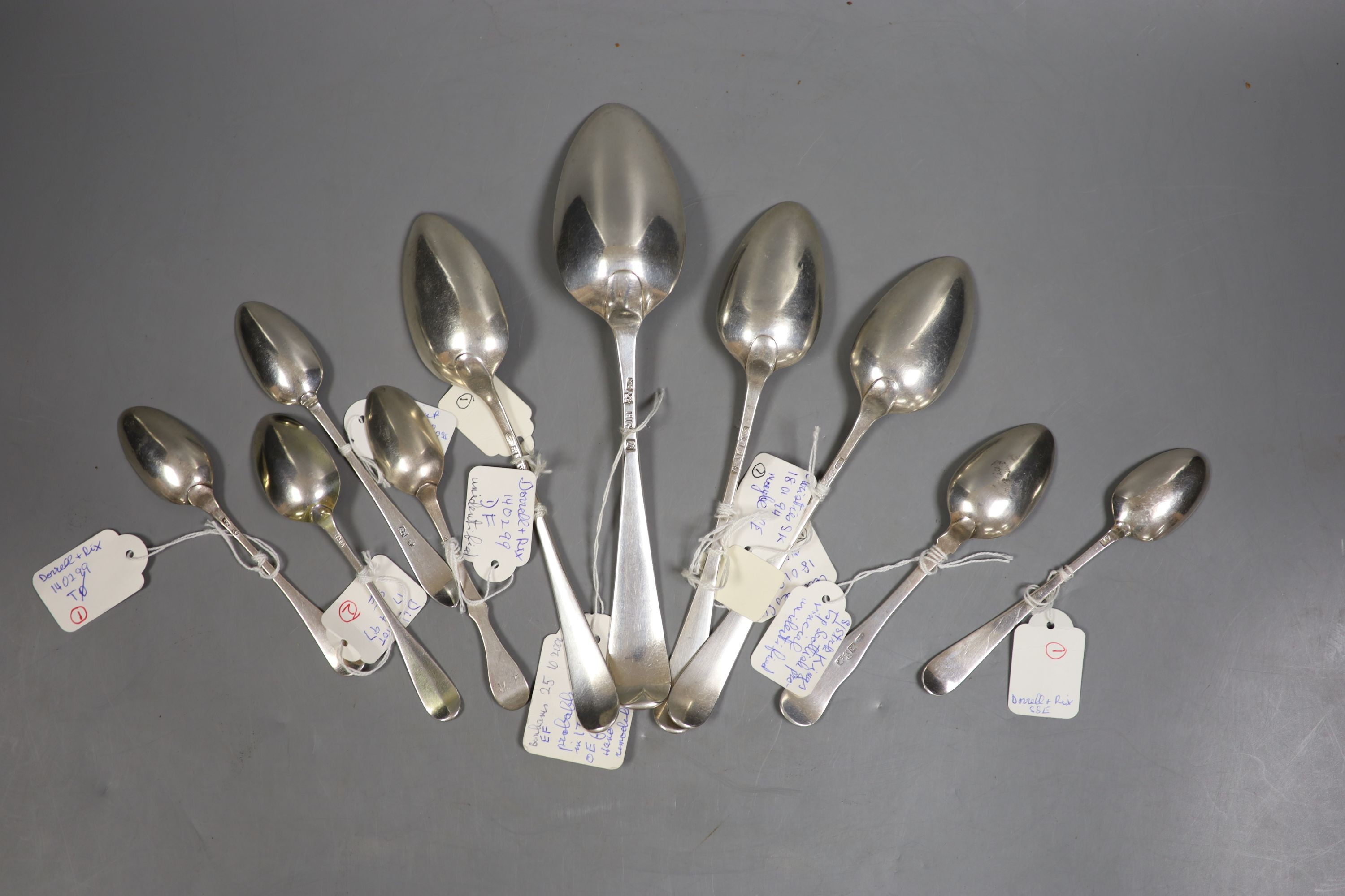 A small collection of 18th century and later Scottish silver flatware, including tablespoon, McD, Edinburgh, 1754, 21.7cm, three dessert spoons, McD, Edinburgh, 1802 and six teaspoons, including one Glasgow and five unid